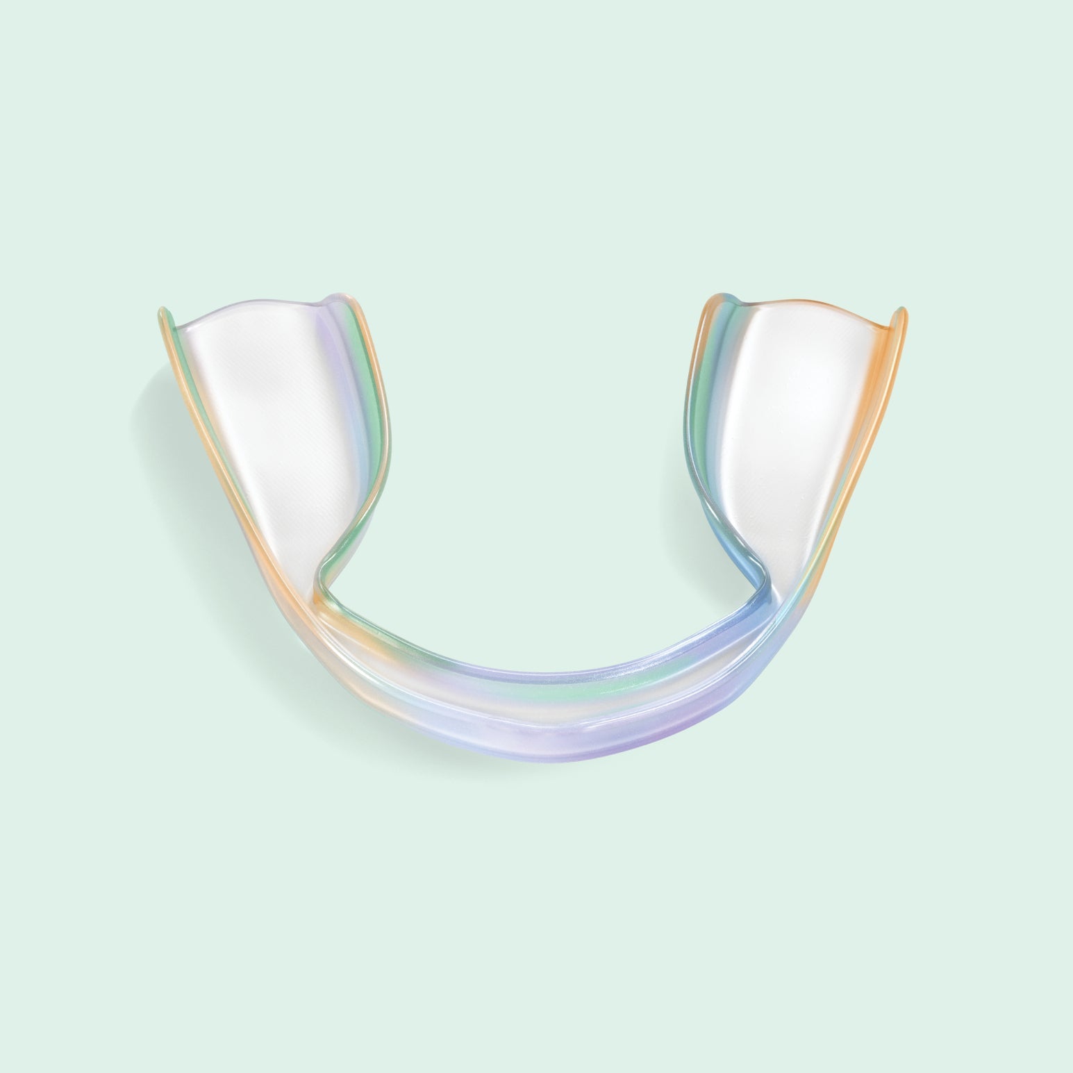 Opalescence Go Advanced 15% prefilled teeth whitening trays displayed in a U-shaped clear tray on a light mint green background