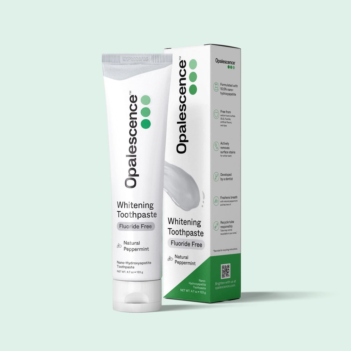 Opalescence whitening toothpaste tube and packaging on a light green background